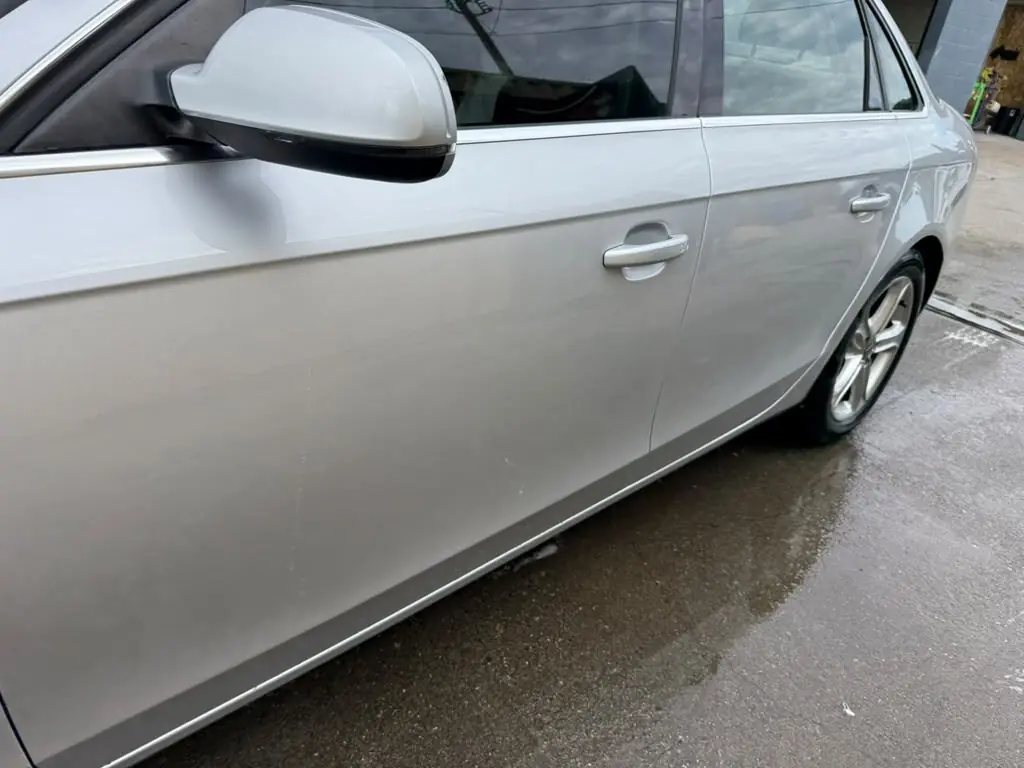 The same Audi A4 doors after repair and paint